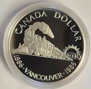 1986 Proof RCM Canadian Silver 1 Dollar Coin. In OGP, 50% Silver. Elizabeth II. - Picture 1 of 3