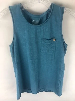 Camisa sin mangas azul bolsillo delantero Zara para niñas talla M Foto 1 de 4