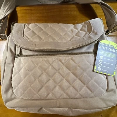NWT Travelon Anti Theft Cross Body Bag Purse Beige Multi Pocket Quilted Front - Image 1 of 4