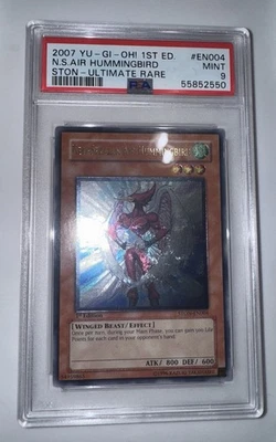 2007 YUGIOH 1ST STON-EN004 NEO-SPACIAN AIR HUMMINGBIRD Ultimate PSA 9 - Image 1 of 2