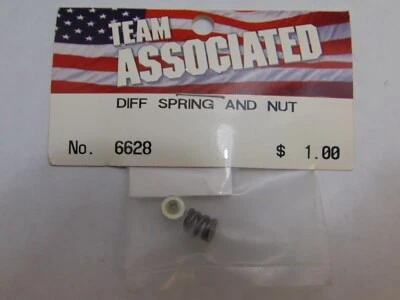  VINTAGE TEAM ASSOCIATED 6628 DIFF SPRING AND NUT - Image 1 of 2