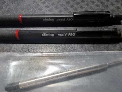 (2) Bolígrafos Rotring Rapid Pro negros - principios de la década de 2000 vintage + 3 recambios Foto 1 de 4