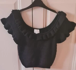 H&M Black Top, size M, waffle knit, scoop neck and cap sleeves with ruffle trim - Picture 1 of 2
