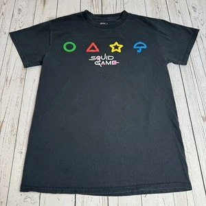 Camiseta Netflix Juego de Calamares Para Hombre Talla Pequeña Manga Corta Cuello Redondo Gráfico Negra - Imagen 1 de 8