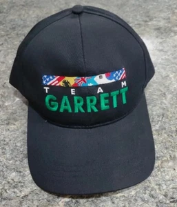 Cappello Berretto Vintage Team Garrett Metal Detectors Nero Regolabile Olimpiadi 2002 Spilla - Foto 1 di 3