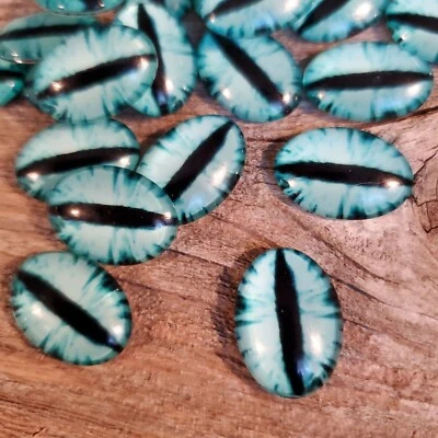 Dragon Eyes Black Aqua Blue GoT Fan Glass Cabochons 18x13mm Oval 2 pcs - Image 1 of 4