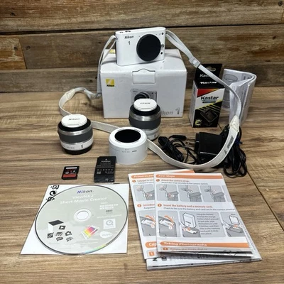 Nikon 1 J1 Full Kit – Mint, 10-30 30–110mm Lenses, SD, Bag, Original Box - Image 1 of 4