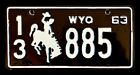 WYOMING 1963  COWBOY BUCKING BRONCO AUTO LICENSE PLATE  " 13 885 " WY 63 WYO