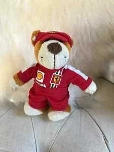 16⚜️ Peluche Doudou Ours Pilote Ferrari F1 Avec Ventouse Gummibar Toys H 15 cm - Imagen 1 de 8