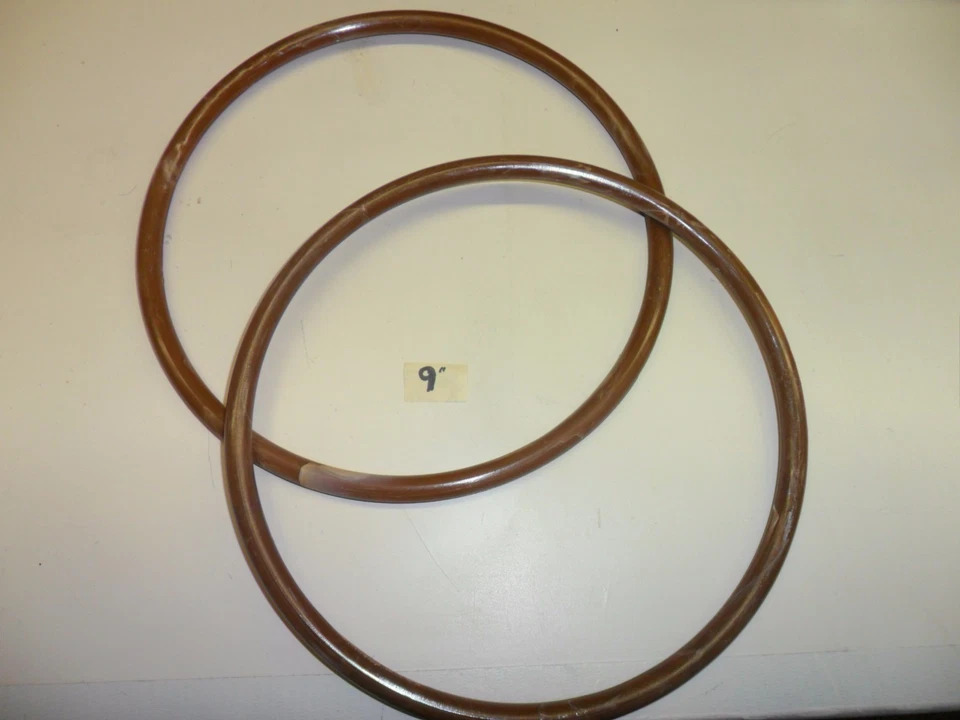 Vintage 9-inch Chocolate Brown and White Swirl Plastic Ring set of 2 - Image 1 of 1