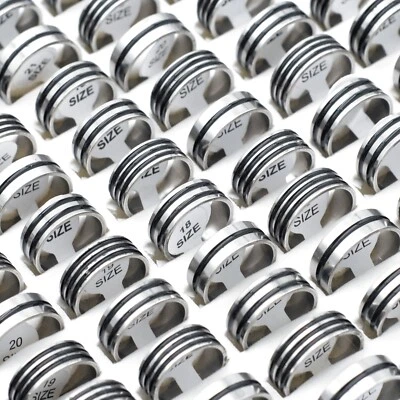 Lote a granel 50 anillos de acero inoxidable a rayas negras simples clásicos hombres mujeres joyas Foto 1 de 4