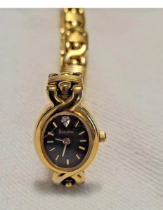 Ladies Vintage Black Dial Bulova Quartz Diamond Accent Watch 97P57 - Picture 1 of 5