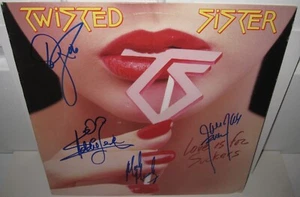 TWISTED SISTER SIGNED LOVE IS FOR SUCKERS ALBUM DEE SNIDER ROCK AUTOGRAPH X4 - Picture 1 of 6