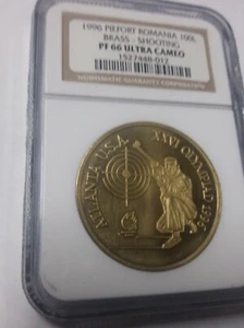 Rare 1996 Romania Brass 100 L Piedfort Pattern  Olympic Shooting  NGC PF 66 - Picture 1 of 2