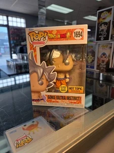 Funko Pop! Dragon Ball Goku (Ultra Instinct) (Glow) Exclusive #1694 W/ Protector - Picture 1 of 6