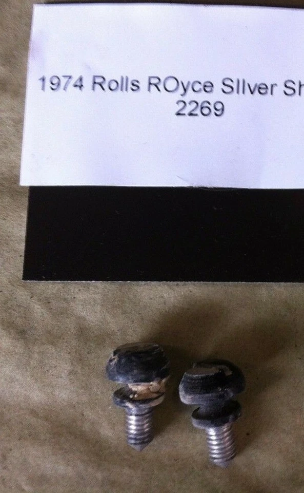 65 - 80 ROLLS ROYCE SILVER SHADOW HEADLIGHT FRAME RETAINER 2 SCREWS  - Image 1 of 1