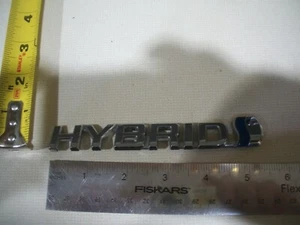 TOYOTA  HYBRID BLUE LETTERS CHROME  SYMBOL EMBLEM  OEM BAGDE - Picture 1 of 1
