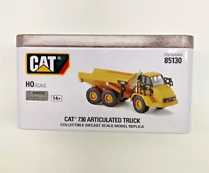 HO SCALE DIECAST MASTERS 85130 CAT 730 ARTICULATED DUMP TRUCK 1/87 - Picture 1 of 16