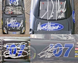 FORD FUSION CARL EDWARDS firmata '07 + 7 piloti pressofusi 1:24 serie Champion - Foto 1 di 16