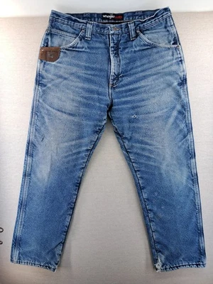 Pantalones de mezclilla Wrangler Riggs forrados de lana para hombre 36x30 aislados calce relajado ropa de trabajo W37" Foto 1 de 4
