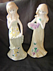 TWO PRETTY 7.5'' HIGH GIRL WITH FLOWERS FIGURINES