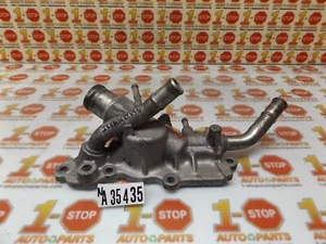 2007-2012 NISSAN SENTRA ENGINE COOLANT THERMOSTAT HOUSING 11060-ET00A OEM - Picture 1 of 7