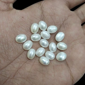 Perla bianca naturale forma ovale cabochon fondo piatto calibrato pietra preziosa sfusa - Foto 1 di 11