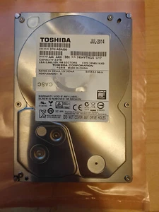 3TB TOSHIBA DT01ABA300 AAA AA00/BB0 HDKPJ08A0A01 S SATA 3.5 GETESTET 7200 U/min - Bild 1 von 3
