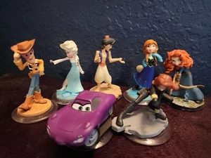 Disney Infinity figures Woody, Elsa, Aladdin, Ana, Merida, Black Widow, Holly - Picture 1 of 2
