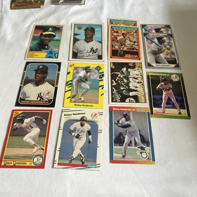 Lote de 14 tarjetas tempranas de Rickey Henderson Topps Bowman Kmart Donruss Score Foto 1 de 4