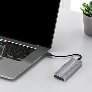 Aluminum Toolless External Solid Disk Enclosure Supporting NVMe 10Gbps Drives - Photo 1/12