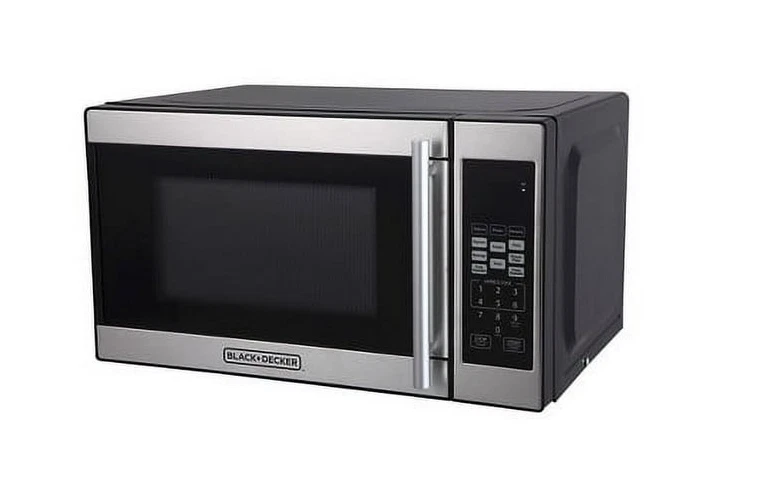 Horno microondas encimera BLACK+DECKER 0,7 pies cúbicos - Acero inoxidable - Usado Foto 1 de 4
