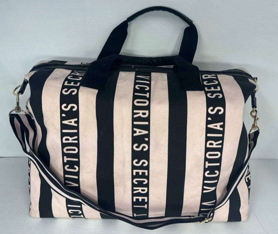 Bolso de lona Victoria’s Secret para pasar la noche de fin de semana. Rosa expandible con negro grande Foto 1 de 4