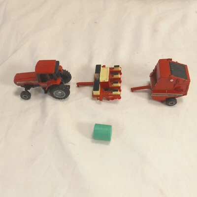 Ertl Case IH 7210 Tractor w/ 8465 Round Baler & Cyclo Air 800 Farm Country 1/64 - Image 1 of 4