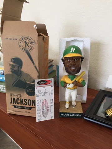 Reggie Jackson A's Bobblehead with Game Ticket Cover
