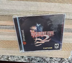 SEGA Dreamcast Resident Evil 2 (COMPLETE) BOTH DISCS AND MANUAL RARE - Picture 1 of 4