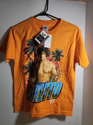 Camiseta naranja vintage juvenil pequeña Carlito “Eat Spit” WWE Wrestling 2007 nueva con etiquetas Foto 1 de 3