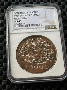 INDONESIA 1974 5000 RUPIAH ORANGUTAN NGC MS65 KM40 - Picture 1 of 2