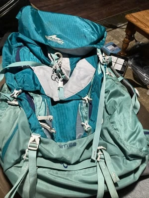 Mochila para mujer Gregory Cairn 58 verde azulado/verde manchada Foto 1 de 4