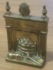 Brass dog sleeping next to fireplace ornament - Picture 1 of 5