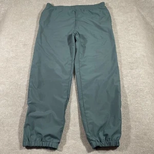 Pantalones deportivos vintage de los 90 forrados Champion para hombre talla mediana verde con cremallera al tobillo - Imagen 1 de 15