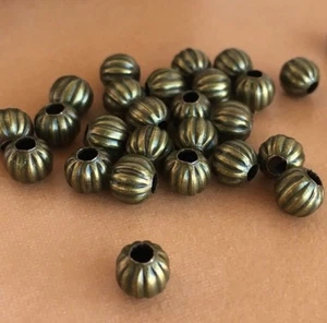 100X Antique Bronze Metal Beads Corrugated 5mm Round Corrugated Pumpkin Spacer - Picture 1 of 5