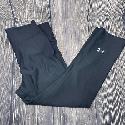 Leggings Under Armour UA HeatGear Capri feminina compressão preta esportiva 3/4 P - Imagem 1 de 4