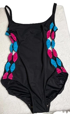 TRAJE DE BAÑO SIRENA DE COLECCIÓN AÑOS 80 PEEK A BOO LATERALES ROSA Y AZUL lazos RARO 10 Pilling Butt Foto 1 de 4