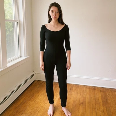 Mono negro pequeño Norma Kamali con hombros descubiertos manga 3/4 para mujer Foto 1 de 4