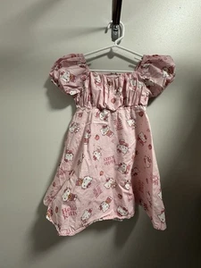 Hello Kitty Baumwolle Kurzarm gesmoktes Kleid rosa AOP Mädchen Größe Small 6/7 - Bild 1 von 8