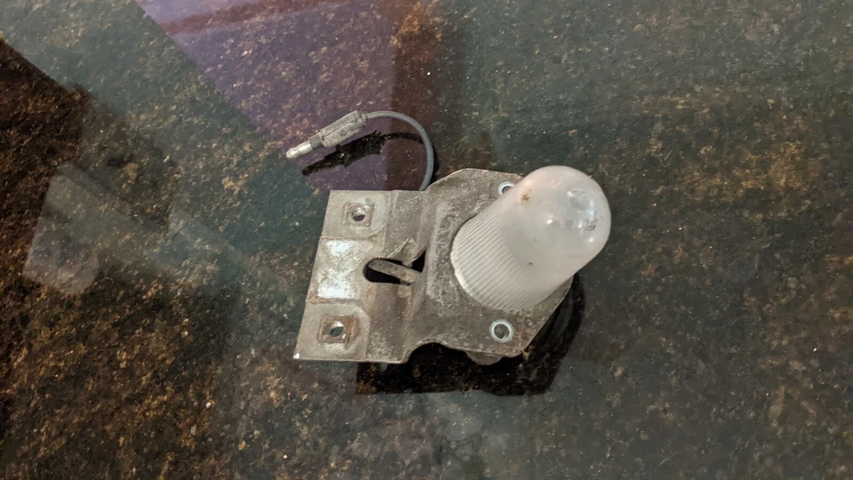 Chrysler and Imperial license plate light 1969-71 Foto 1 de 1