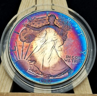 Moneda de prueba Silver Eagle Tonificada 1987-S 1 OZ Tonificación Arco Iris 🌈 Foto 1 de 4