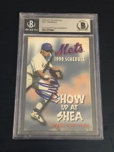 Auténtico calendario de bolsillo de los Mets 1998 autografiado firmado por Rey Ordonez Beckett Bas - Imagen 1 de 2