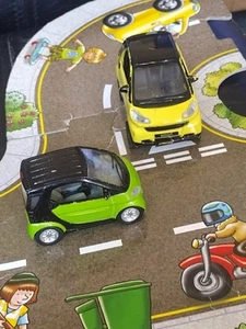 2 x diecast SMART CARS - unbranded green & Maisto 1:32 yellow vehicle - Playworn - Picture 1 of 14